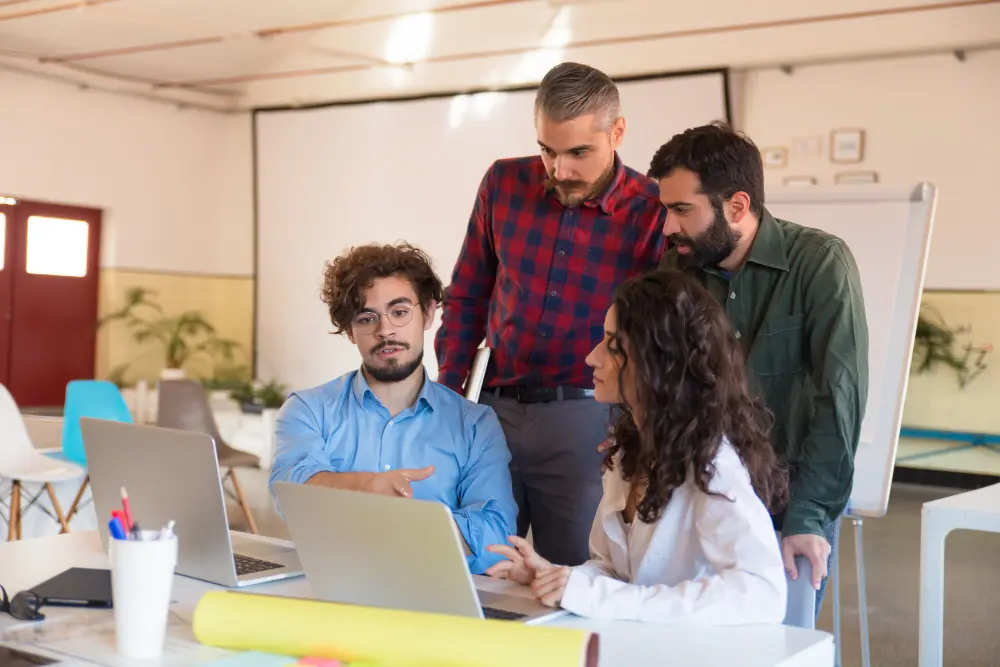Remotiv recruiters reviewing a candidate shortlist with a client